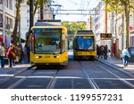 Small photo of Karlsruhe/Germany - September 30 2018: Public yellow rail trains with passenger taking them for transportation to get to another destination