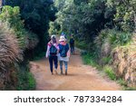 Tourists walk in Horton Plains