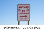 Danger  No Swimming Sign With A ...