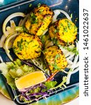Small photo of Tandoori Fish Tikka is a highly relished non-vegetarian appetiser with origin to Indian cooking. With traditional Indian preparation, the fish retains its tender taste and turns crispy from outside