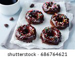 Baked chocolate doughnuts with chocolate glaze. toning. selective focus