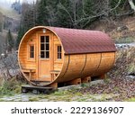 A private accommodation unit in the form of a large wooden barrel or a glamping bungalow in a barrel - the Calfeisental valley and in the UNESCO World Heritage Tectonic Arena Sardona, Switzerland