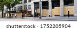 Small photo of NEW YORK, NEW YORK/USA - June 2, 2020: Businesses closed during George Floyd protests in lower Manhattan. Profanity on image has been censored.