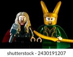 Small photo of KYIV, UKRAINE - FEBRUARY 19, 2024: LEGO Marvel's The Mighty Thor with the Mjolnir and Loki in the horned helmet