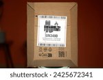A flammable lithium battery is shipped in an envelope with a danger label. The label warns of the fire risk and shows the UN3480 code for lithium batteries. The envelope is sealed.