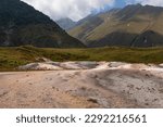 Small photo of Colorful landscape with mineral springs on ground in Truso Gorge in Kazbegi district, Mtskheta-Mtianeti region, Georgia. Truso Valley in the Greater Caucasus Mountains. Geyser, volcanic. Wanderlust.