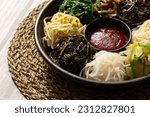 Ingredients for bibimbap, red pepper paste and various vegetables