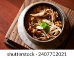 Small photo of Mushroom Stone Pot Rice, Stone Pot Rice