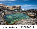 Rock Pool In Foreground With...