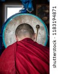Small photo of IVOLGINSKY DATSAN, ULAN UDE, SIBERIA, RUSSIA - MARCH 24, 2018: Buryat buddhist monk are praying at the Dzogchen Dugan in Ivolginsky datsan