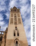 Small photo of The Catedral de Sevilla (Cathedral of Saint Mary of the See) and La Giralda. Giralda is the name given to the bell tower of the Cathedral.