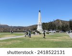 Small photo of Los Angeles, California, USA, June 20, 2022: The Astronomers Monument in front of Griffith Observatory. The Astronomers Monument pays homage to six of the greatest astronomers of all time.