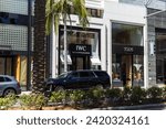 Small photo of Los Angeles, California, USA, June 21, 2022: IWC Schaffhausen and Tod's Rodeo Drive street signs in Beverly Hills.