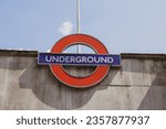 Small photo of Westminster, London, United Kingdom - June 19th 2023: The classic London Underground roundel above the entrance to the Embankment tube station