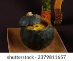 Small photo of Jerked beef or biltong or dried meat broth in pumpkin, a brazilian dish.