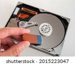 Small photo of Complete erasure deletion of data on the drive, personal data protection, digital security, recovery of lost files on the computer, close up