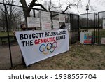 Small photo of Washington, DC â€“ March 17, 2021: Uyghur activists at the White House protest the continuing genocide against their people in China asking the Biden administration to boycott the 2022 Olympic Games.