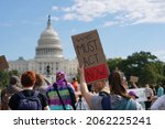 Small photo of Washington, DC – October 22, 2021: Climate Crisis activists demonstrate at the U.S. Capitol calling on President Biden to take immediate and decisive action to avert a looming disaster.