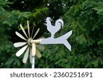 Small photo of Windmill in the garden with weathercock