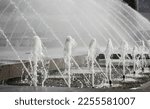 Small photo of gush of water of a fountain. Fountain Water Spashing