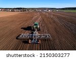 Tractor Plowing Farm Field....