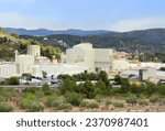 Gypsum plant in Spain. Wholesale of building materials. Chalk factory and ready mix concrete. Plant for production of Gypsum and dry mortar. Industrial plant. Mountain landscape with hills in Terul.