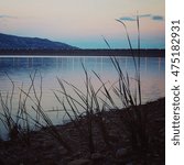 Small photo of Lake Nicoletti coast near Enna city. Aged photo. View of Lake Nicoletti, with sunset. Near the Enna city. Sicily, Italy.