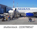 Small photo of SANTORINI, GREECE –24 OCT 2022- View of an airplane from Greek airline Aegean Airlines (A3) at the Santorini Thira International Airport (JTR) operated by Fraport.