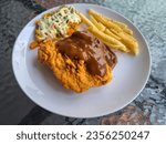 Small photo of Crispy Dory Steak With Dory Fillet Fish Meat, French Fries, Mix Vegetables With Brown Gravy Sauce And Mayonnaise. Food Menu
