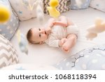 Cute Baby Lies In A White Round ...