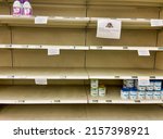 Small photo of San Diego, CA USA - May 16, 2022: View of empty Baby formula shelves at the grocery store. Baby formula shortage due to recall.
