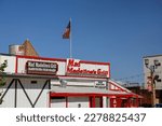Small photo of Temecula, CA United States - October 8, 2022: The Mad Madeline's Grill store front sign.