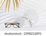 Two pairs of eyeglass frames on ...
