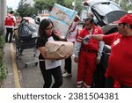 Small photo of Mexico City, Mexico. October 27, 2023. Volunteers receive and sort donations at the Mexican Red Cross collection center. All donations will be sent to Acapulco to help the victims of Hurricane Otis.