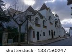 Small photo of Alberobello, Italy - 14.02.19: View of the Church of Sant'Antonio di Padova, known as the Hammer of the Heretics, built for 14 months in 1927 using the same traditional technique as for the trullo.