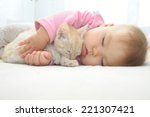 Baby And Cat Sleeping Together...