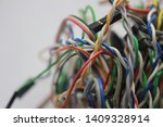 stock-photo-busy-wiring-close-up-of-colorful-electrical-cables-isolated-on-white-a-ball-of-colored-wires-a-1409328914.jpg