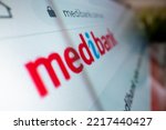 Small photo of Melbourne, Australia - Oct 21, 2022: Close-up view of Medibank logo on its website, shot with macro probe lens