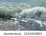 Big wave near the ocean, pure azure water, stormy weather, bursts, texture, splashes, bokeh, selective focus, splash screen, beautiful nature, tourism, look at the waves, white water, power,beach