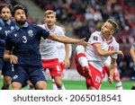 Small photo of WARSAW, POLAND - 9 OCTOBER, 2021: FIFA World Cup Qatar 2022 Qualifiers Match, Poland Vs San Marino 5:0, o.p: Mirko Palazzi of San Marino and Przemyslaw Frankowski of Poland