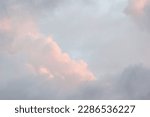 pastel coloured fluffy clouds background