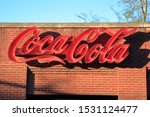 A Sign Advertising Coca Cola On ...