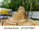 Small photo of SOKOLNIKI, MOSCOW, RUSSIA - August 2, 2015: "From time immemorial". Russian exhibition of sand sculptures. Composition "The origin of life". Author Irina Taflevskaya.