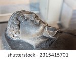 Small photo of Anthropoid Sarcophagus of a man. Mixed Egyptian-Greek-style sarcophagus from Sidon. Close up fragment, selected focus. Istanbul, Turkey. October 18, 2022