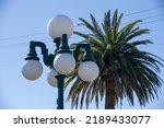 Afternoon view of a historic street lamp in downtown Monrovia, California, USA.