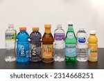 Small photo of Lawton, Oklahoma USA - June 10 2022: Display of various beverages in plastic bottles. Bottled drinks