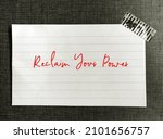 Small photo of Note stick on wall with handwritten text Reclaim Your Power, self talk affirmation to encourage people who tired of feeling stuck in career or relation to reclaim power and reinvent their life