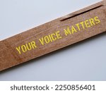 Small photo of Wood with text written YOUR VOICE MATTERS, concept of expressing one internal world out to the public space, every voices deserves to be heard