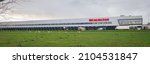 Small photo of Bleiswijk, Netherlands - January 2022: Panoramic view of huge distribution center with many docks of Dirk van den Broek, a Dutch supermarket chain.