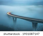 Highway bridge on a foggy evening